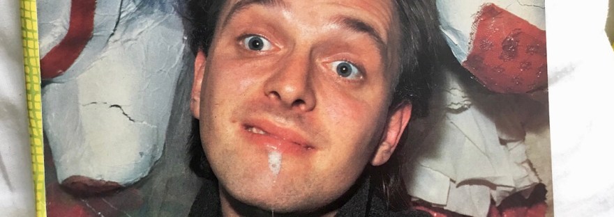 Rik Mayall dribbling picture from Kerrang magazine