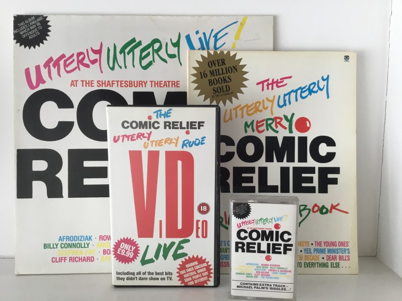 Comic Relief Utterly Utterly Live, the LP, Book, Video and Cassette Tape.